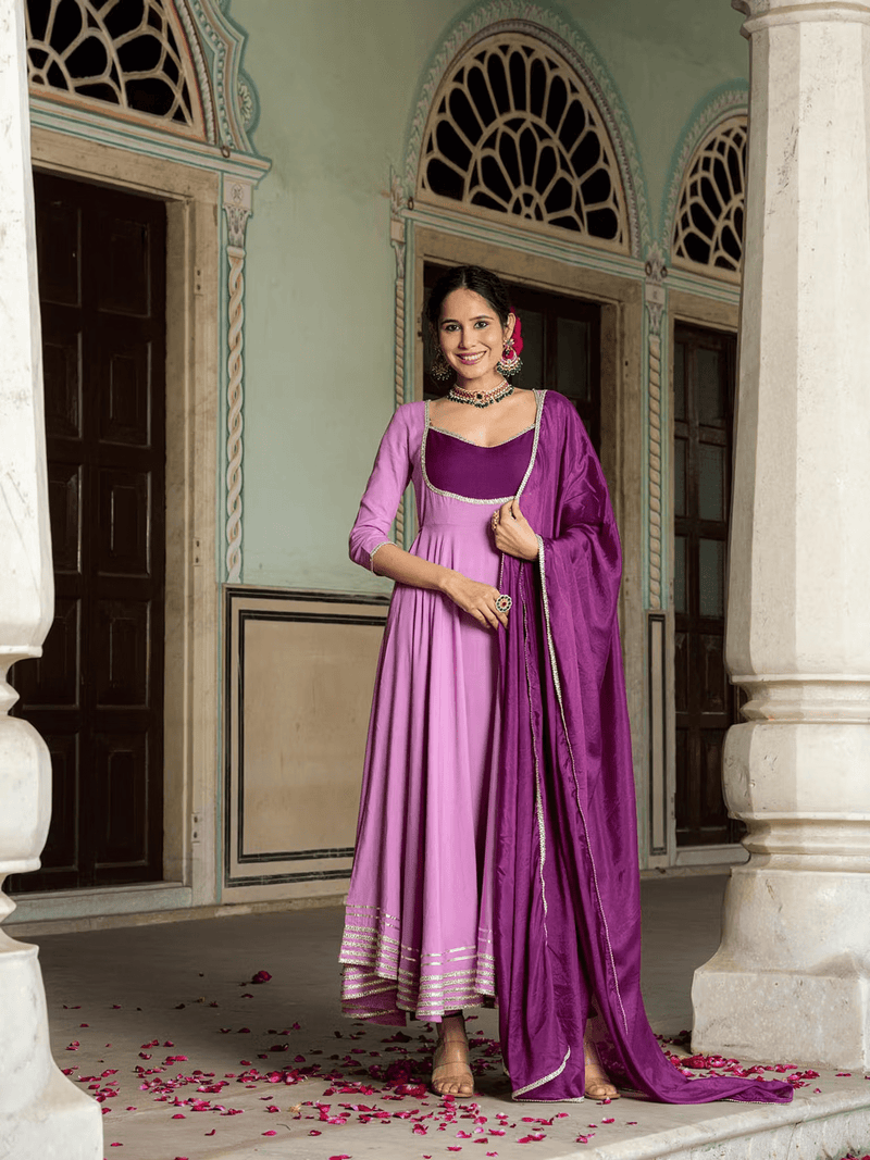 Elegant purple Anarkali suit from Aromie featuring a beautiful design, perfect for festive occasions in Canada