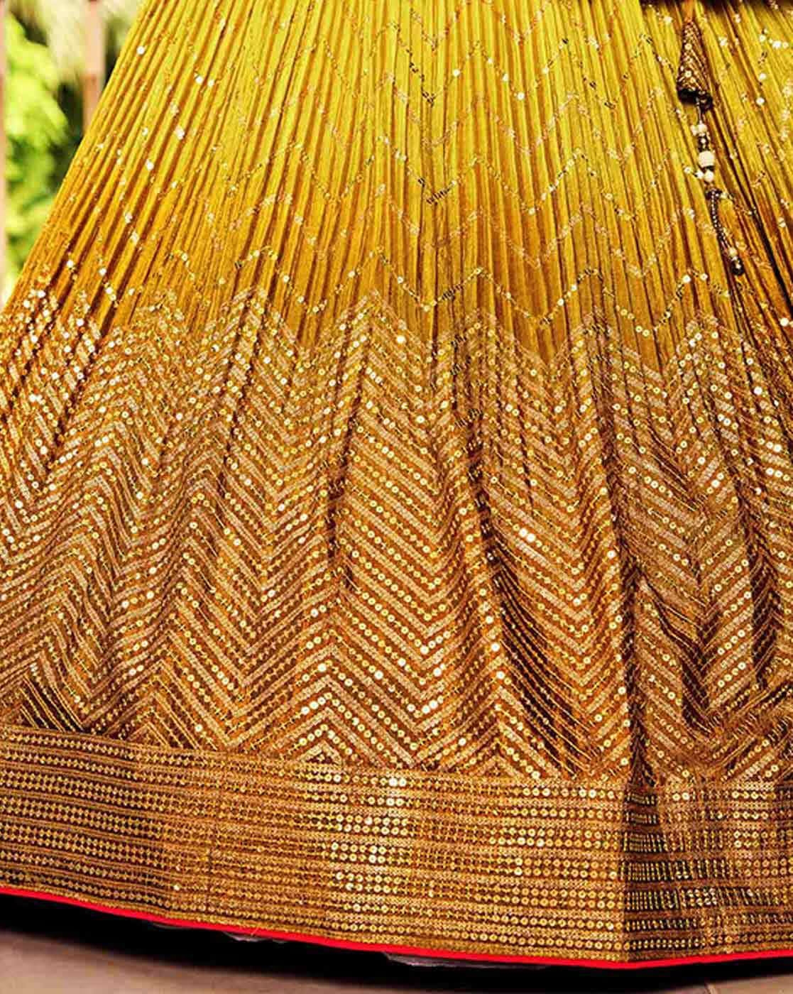 Gold sequin embroidered skirt with chevron pattern and heavy border embellished flared lehenga choli Canada
