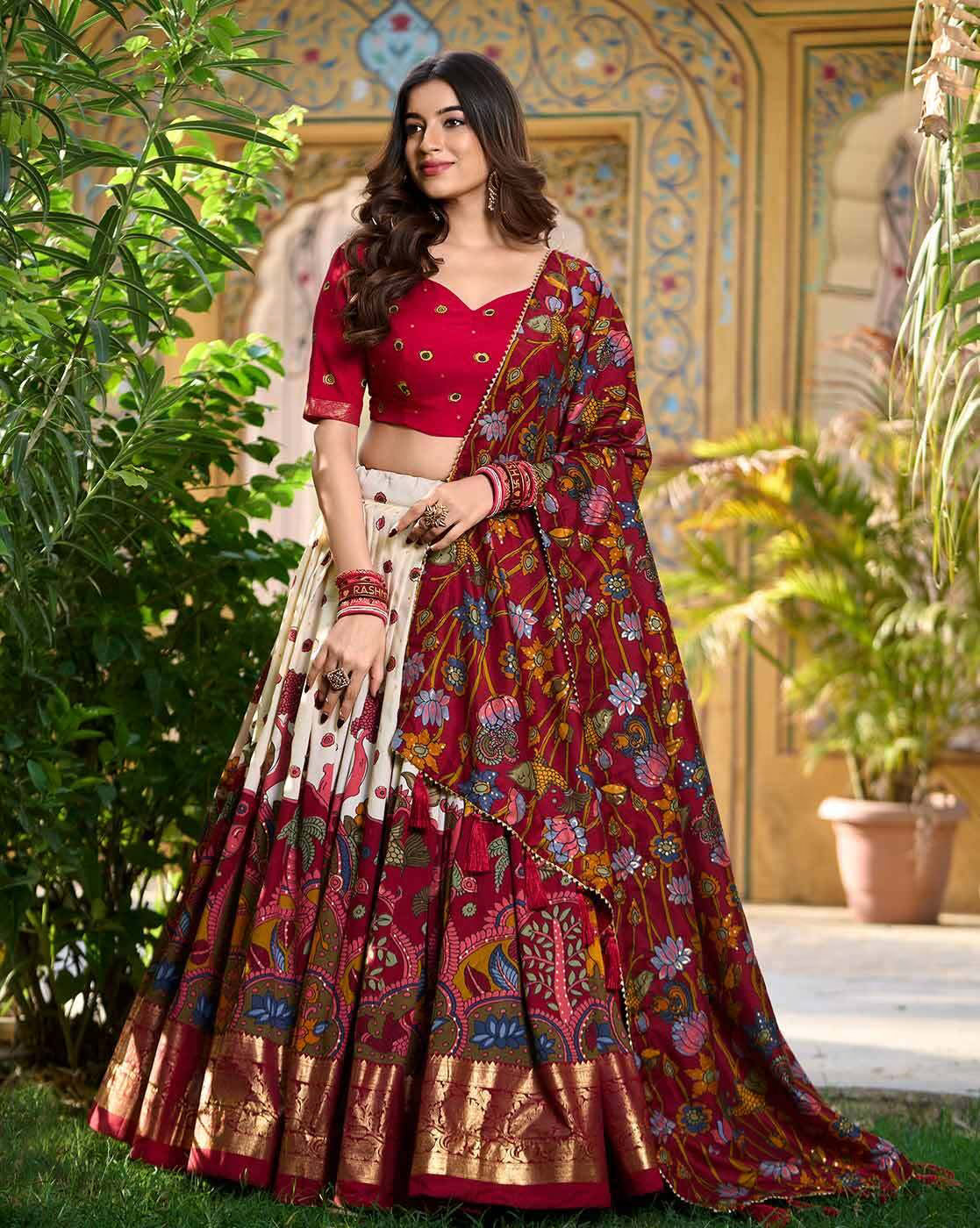 Red floral lehenga with gold border and matching choli and dupatta model wearing lehenga choli set Canada
