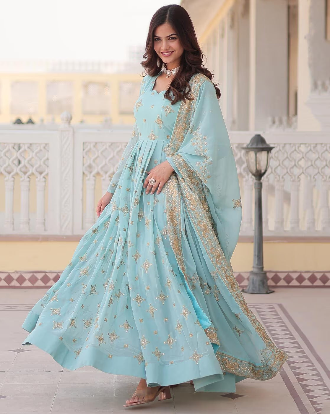Aromie three piece Kurtha sky blue Anarkali with gold geometric motifs worn by model Orange Geometric Angrakha Anarkali
