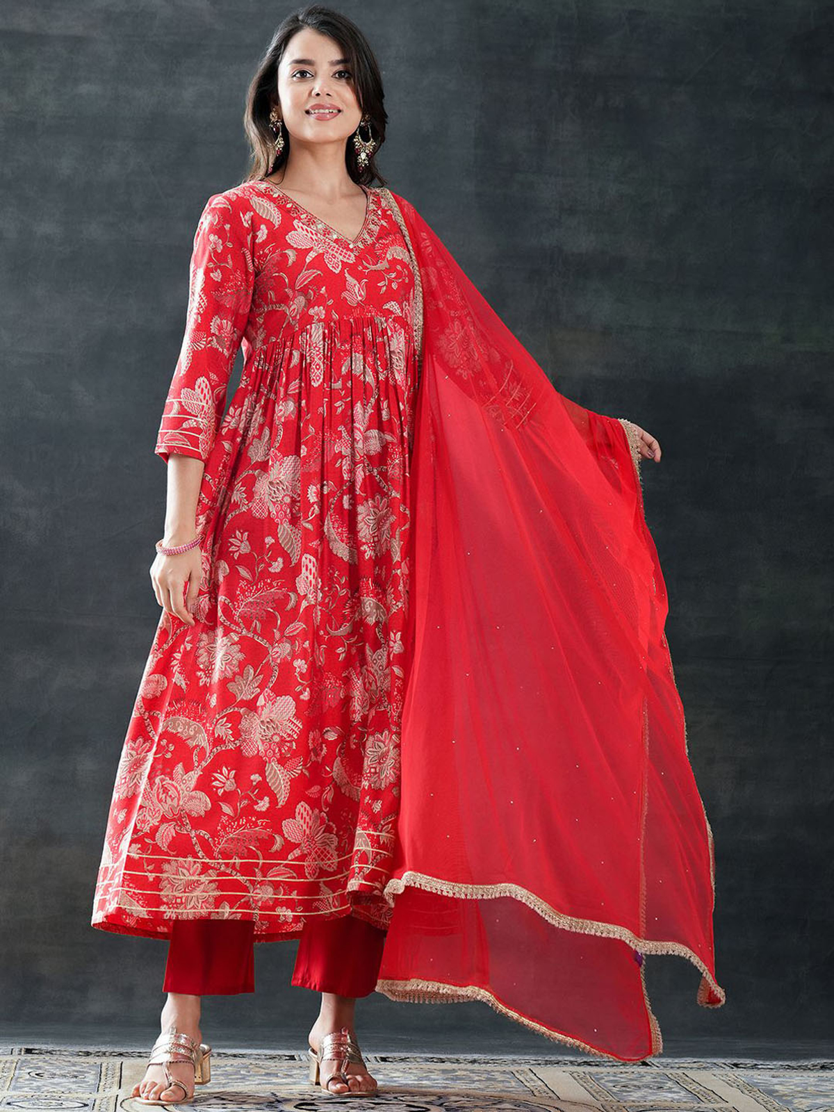 Aromie Rayon printed outfit set featuring a red kurtha with intricate floral patterns and a matching dupatta