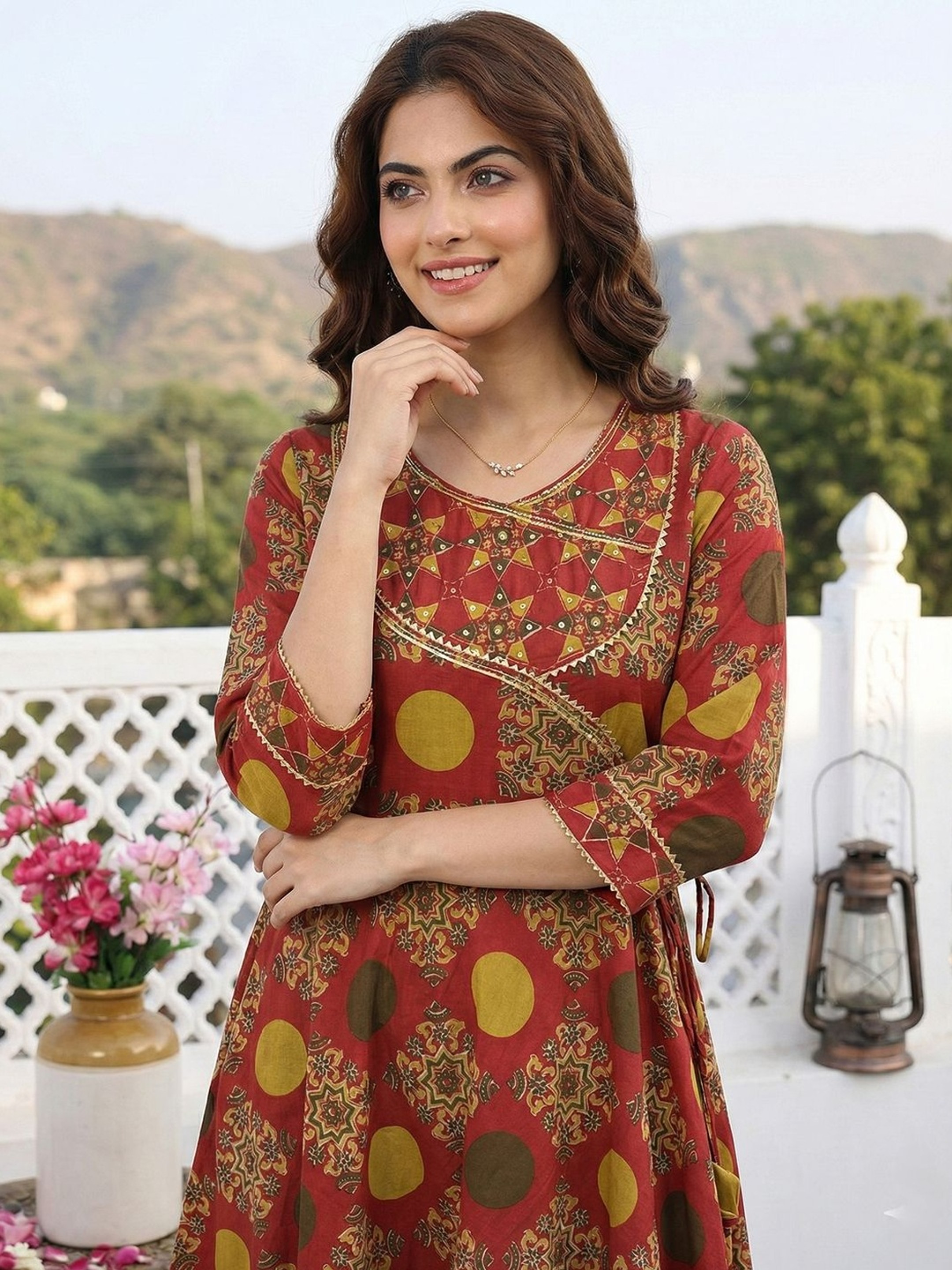 Front view of a red anarkali kurta set with dupatta in lightweight fabric, perfect for festive occasions