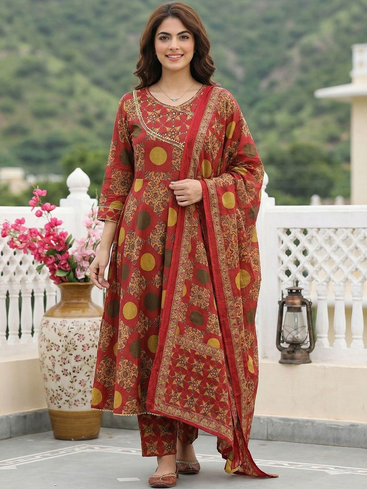 Front view of a red anarkali kurta set with dupatta, featuring floral patterns and comfortable fabric, ideal for festivals.