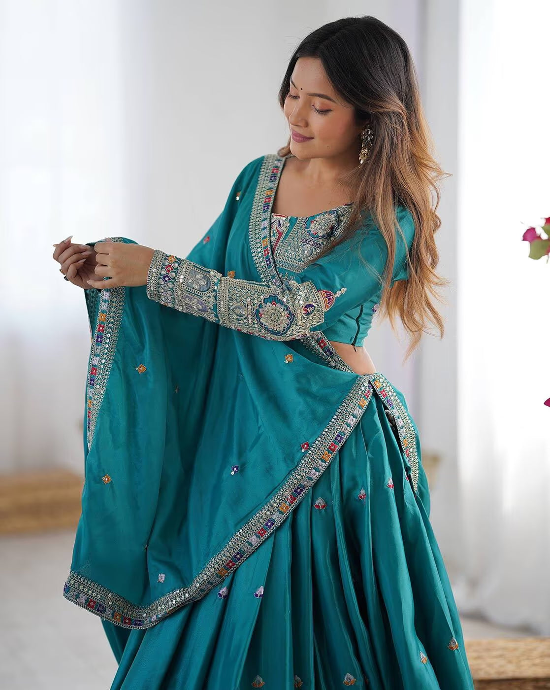 Teal embroidered lehenga choli set Canada with intricate silver embroidery on blouse sleeves and dupatta