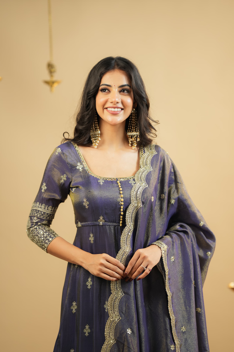 Royal purple Anarkali suit Canada made of elegant fabric with detailed embellishments, perfect for festive occasions.