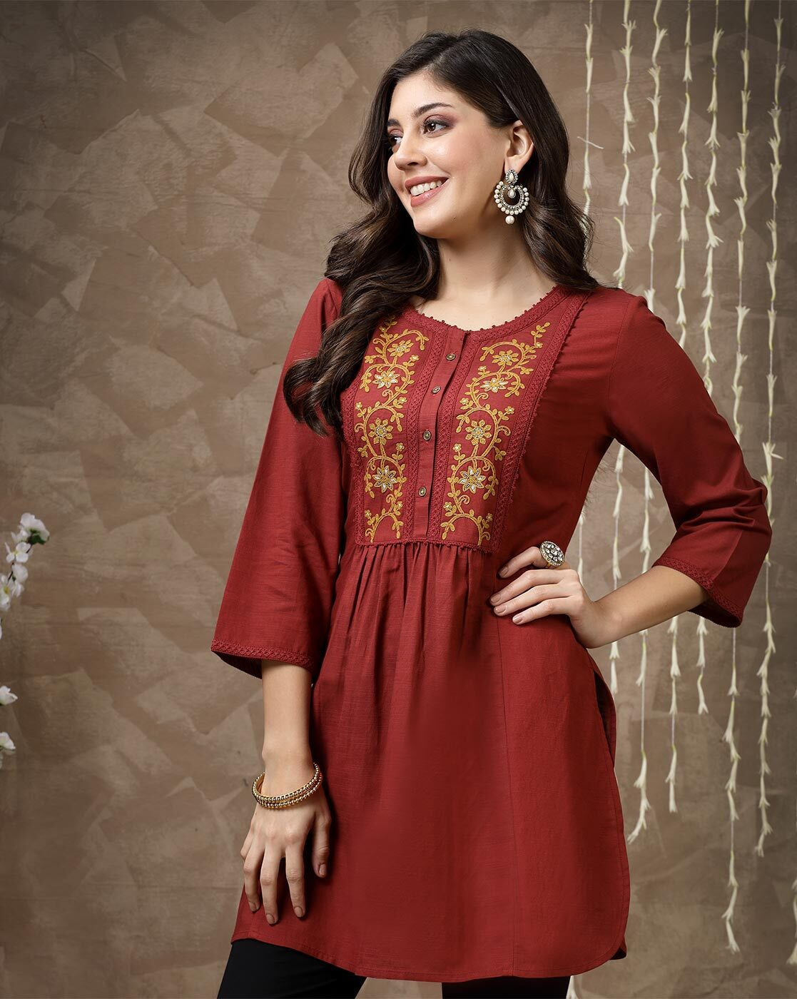 aromie embroidered tunic for women maroon top with gold floral front embroidery three quarter sleeves pleated waist