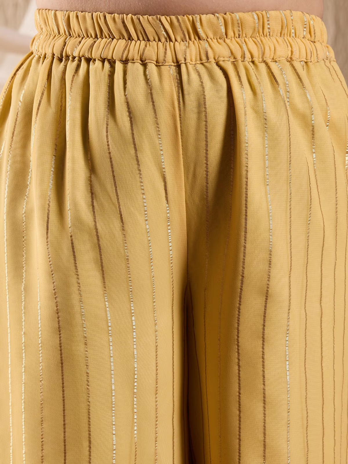 Indian kurta palazzo dupatta set Canada mustard yellow palazzo pants close up elastic waistband with vertical metallic stripes