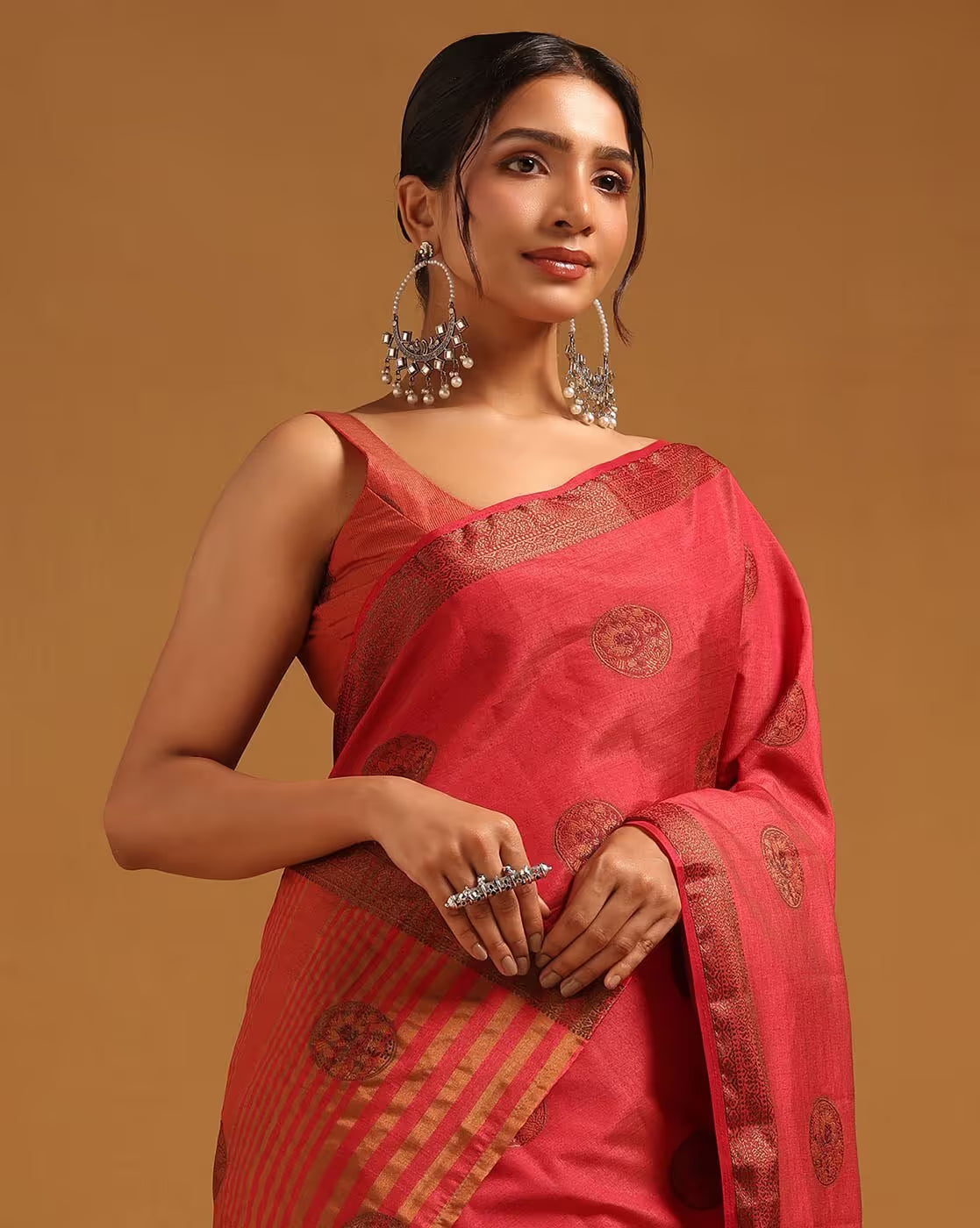 Front view of an affordable cotton silk saree in rich red with golden patterns, perfect for festive occasions in Canada