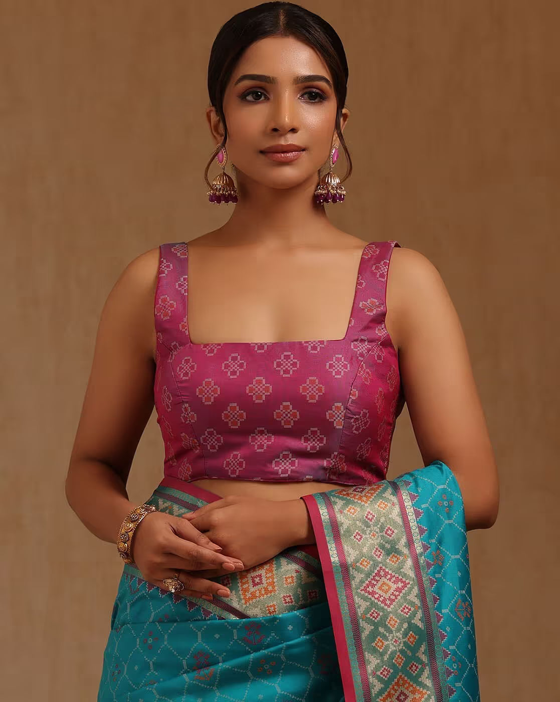 Elegant teal and pink saree online Canada made from silk, perfect for festive events and weddings