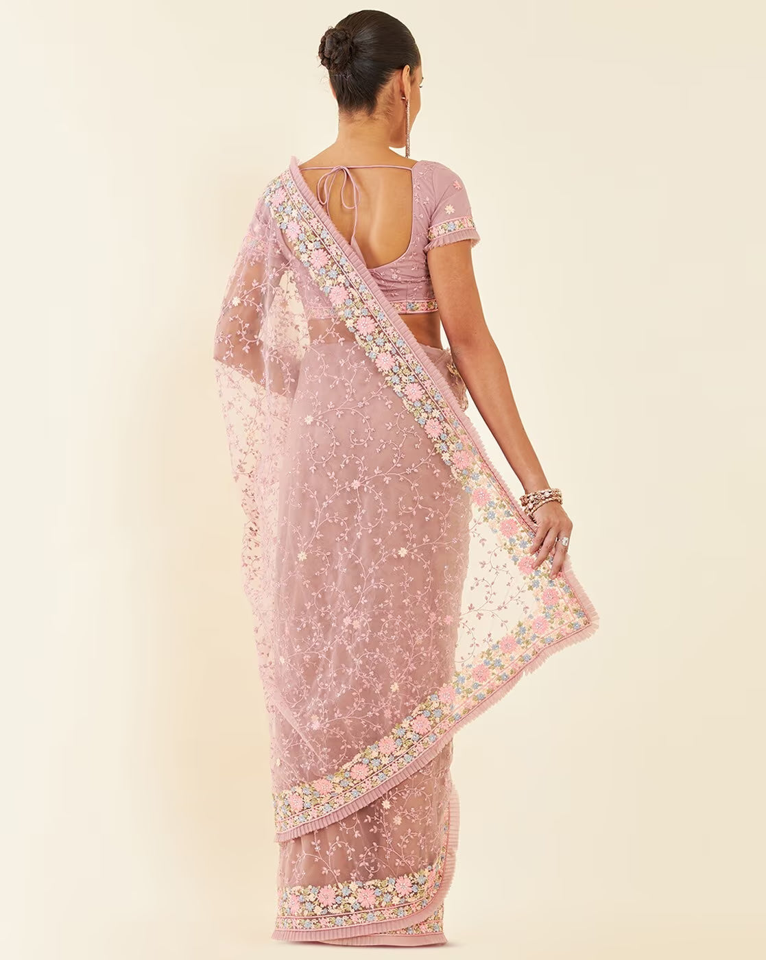 Satin embellished saree Canada in soft pink with floral embroidery and a graceful drape