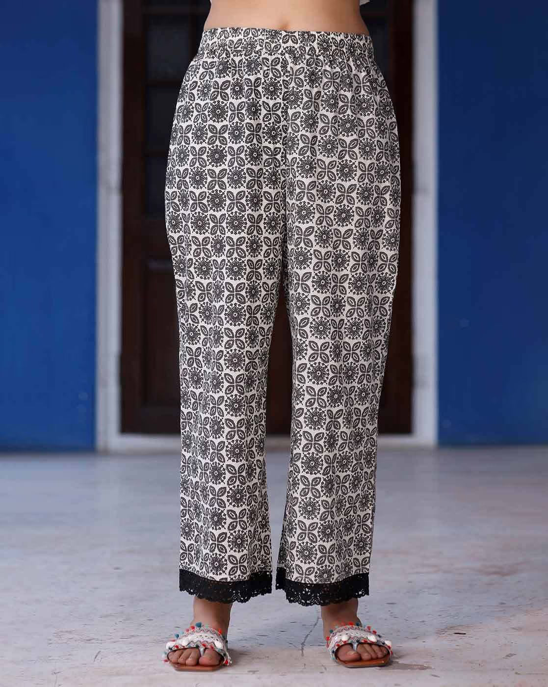 Stylish black and white printed pants for a sea green ethnic kurta set from Aromie