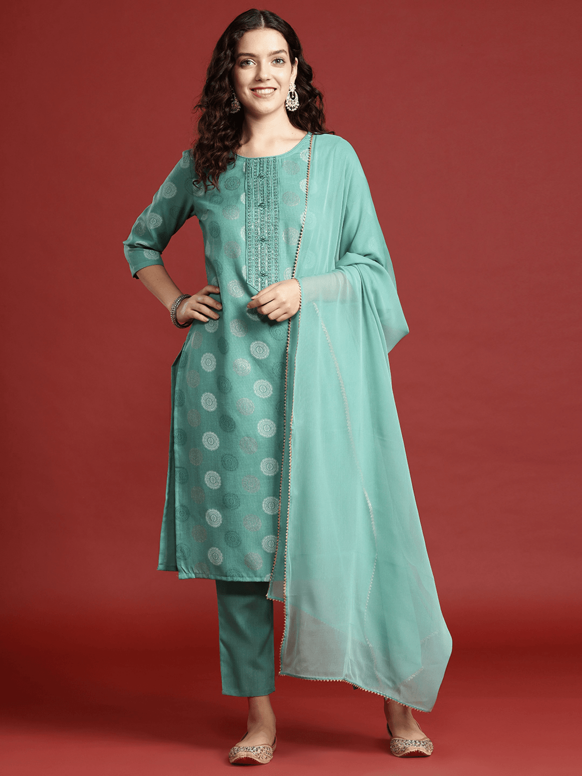 Elegantly designed sea green ethnic kurta set with intricate details and matching dupatta