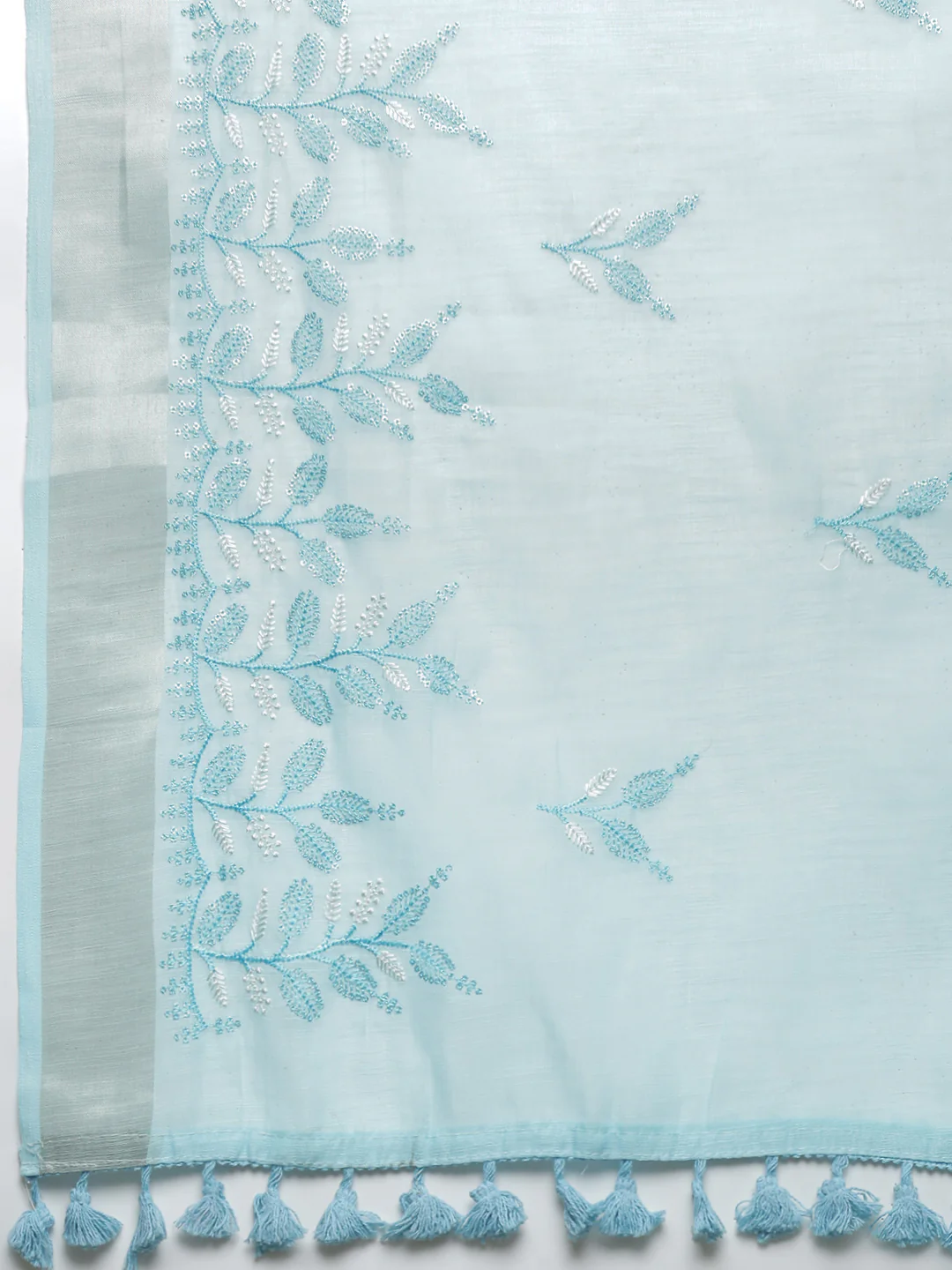 Light blue semi linen embroidered saree from aromie with intricate leaf designs ideal for formal occasions in Canada