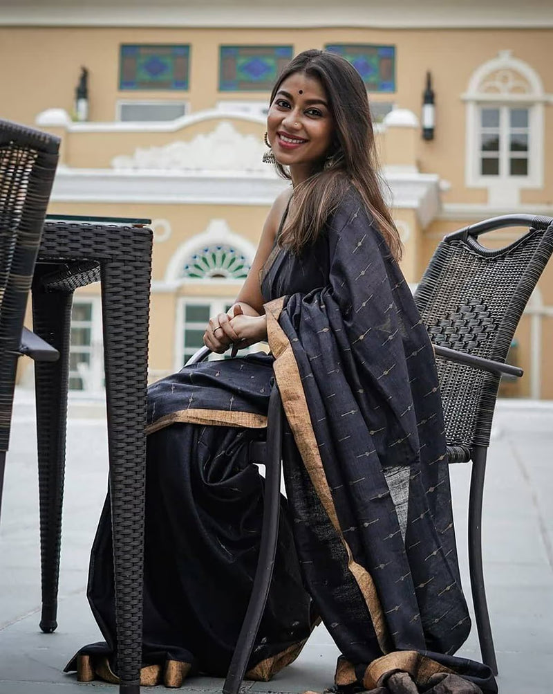 Elegant woman wearing a sequin embellished saree online with a stylish design and intricate details