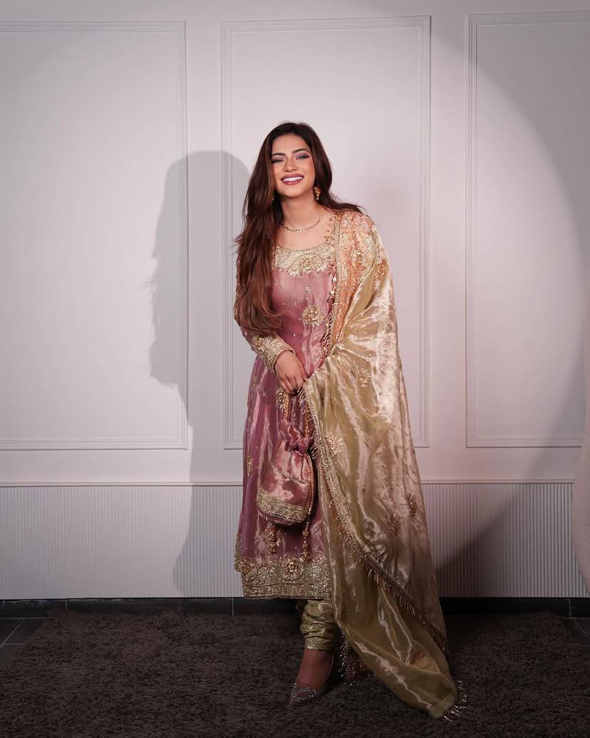 Pink sequin embroidered kurta pant set in silk fabric with intricate gold detailing, perfect for weddings.