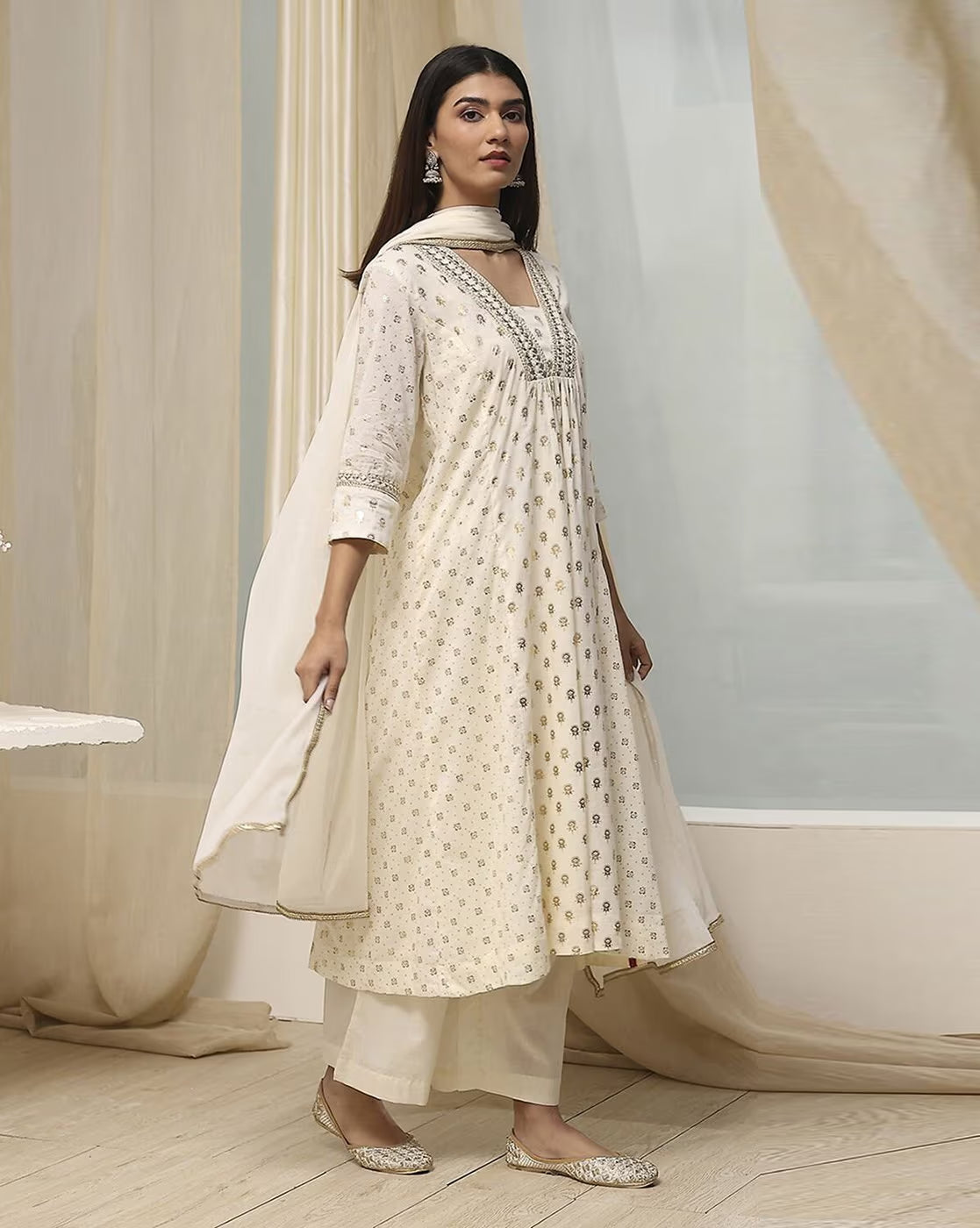 Aromie sequined embroidered kurta suit set in ivory with matching churidar and dupatta for elegant occasions