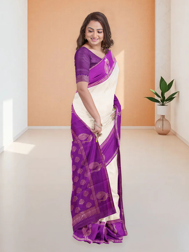 Elegant purple and cream silk art saree perfect for weddings in Canada with intricate detailing and a graceful drape