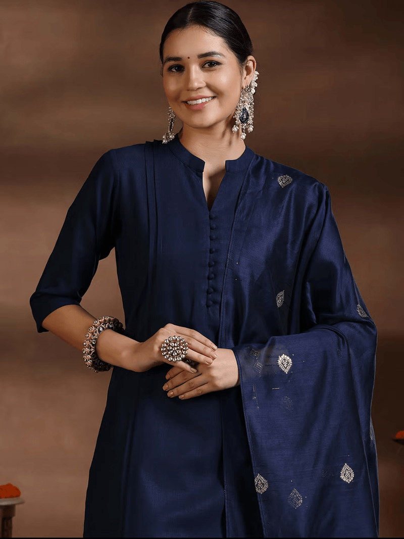 Aromie silk blend kurta set in navy blue with intricate embellishments and elegant design features