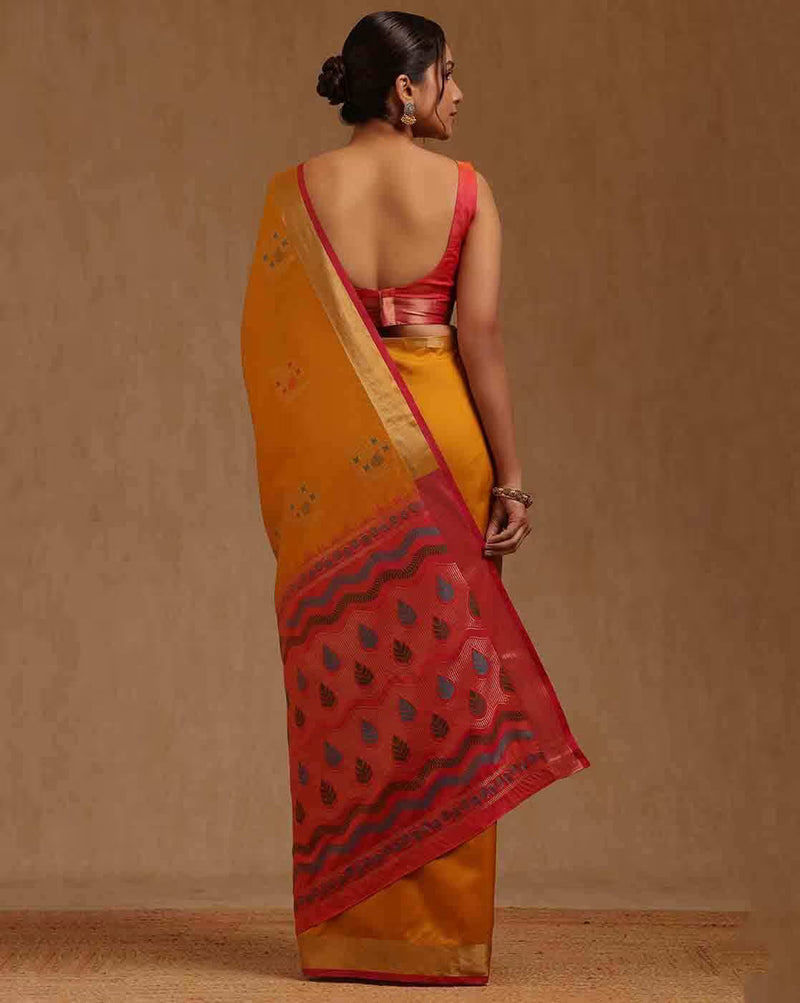 Elegant yellow silk blend saree Canda with red border, perfect for festive occasions or weddings.