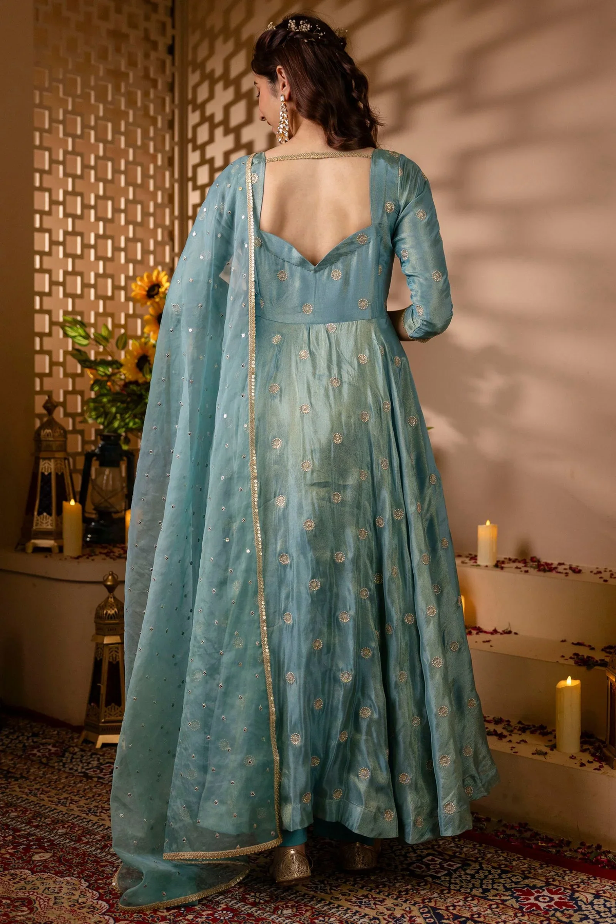 Back view of a three piece Kurtha in light blue silk embroidered anarkali suit set, perfect for weddings