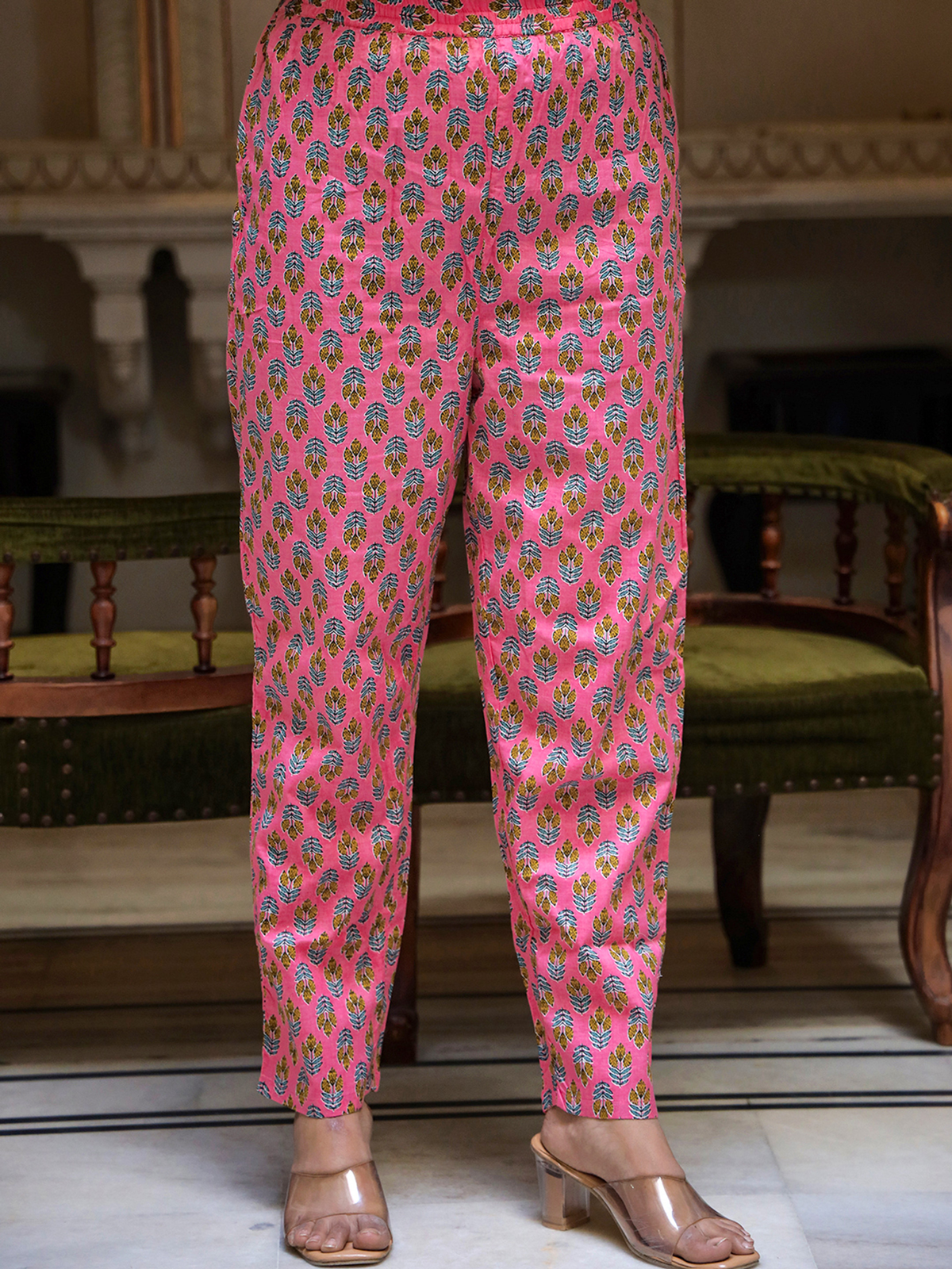 Aromie silk pleated tunic Canada with vibrant pink floral print and stylish pants