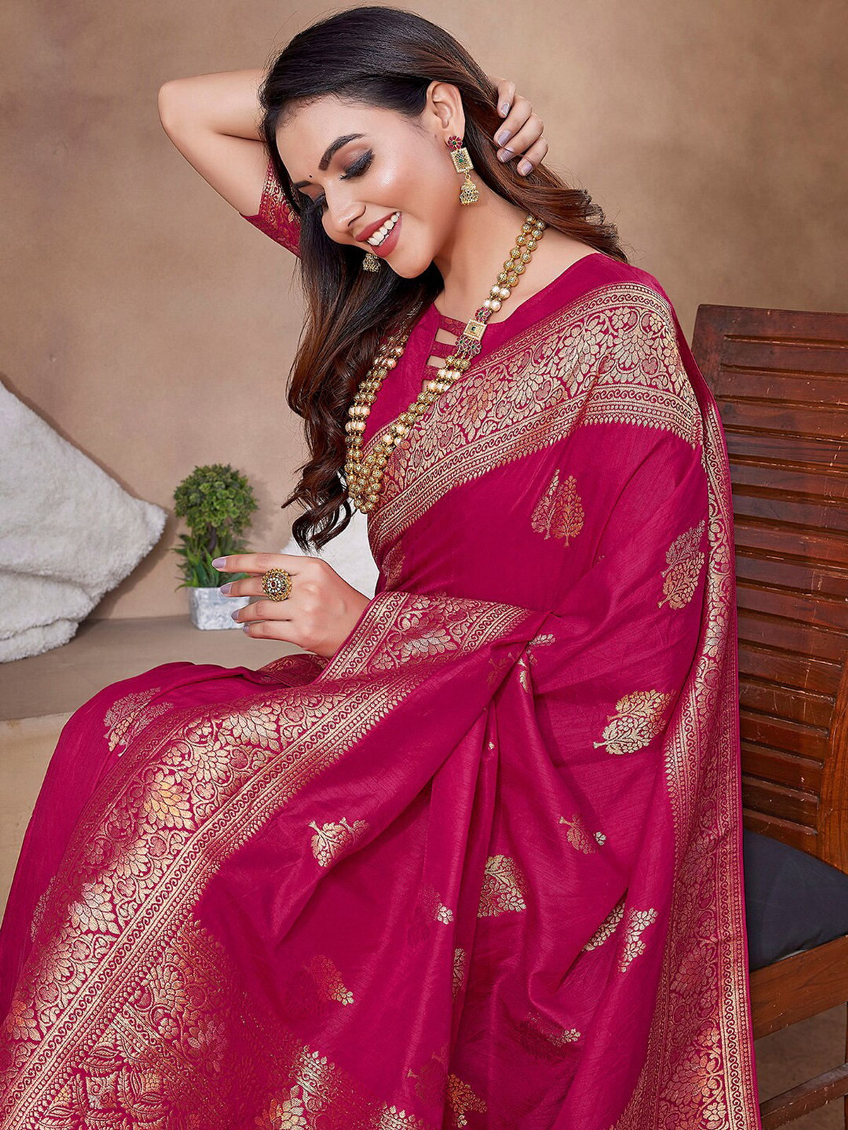 Elegant front view of a maroon silk saree with gold embroidery for special occasions in Canada