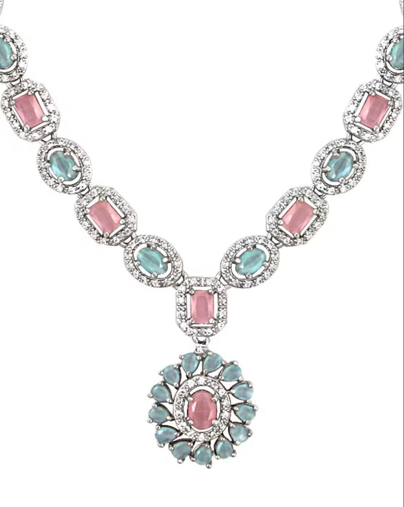 Elegant silver plated jewelry set for women featuring pink and blue gemstones, perfect for formal occasions.
