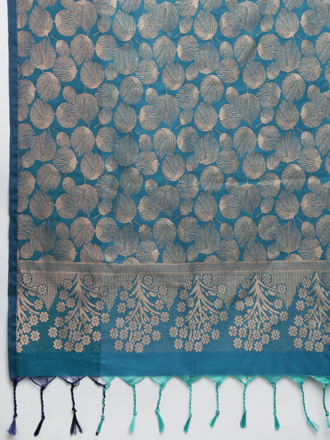 Elegant teal soft silk saree Canada with intricate floral motifs and detailed borders, perfect for weddings.