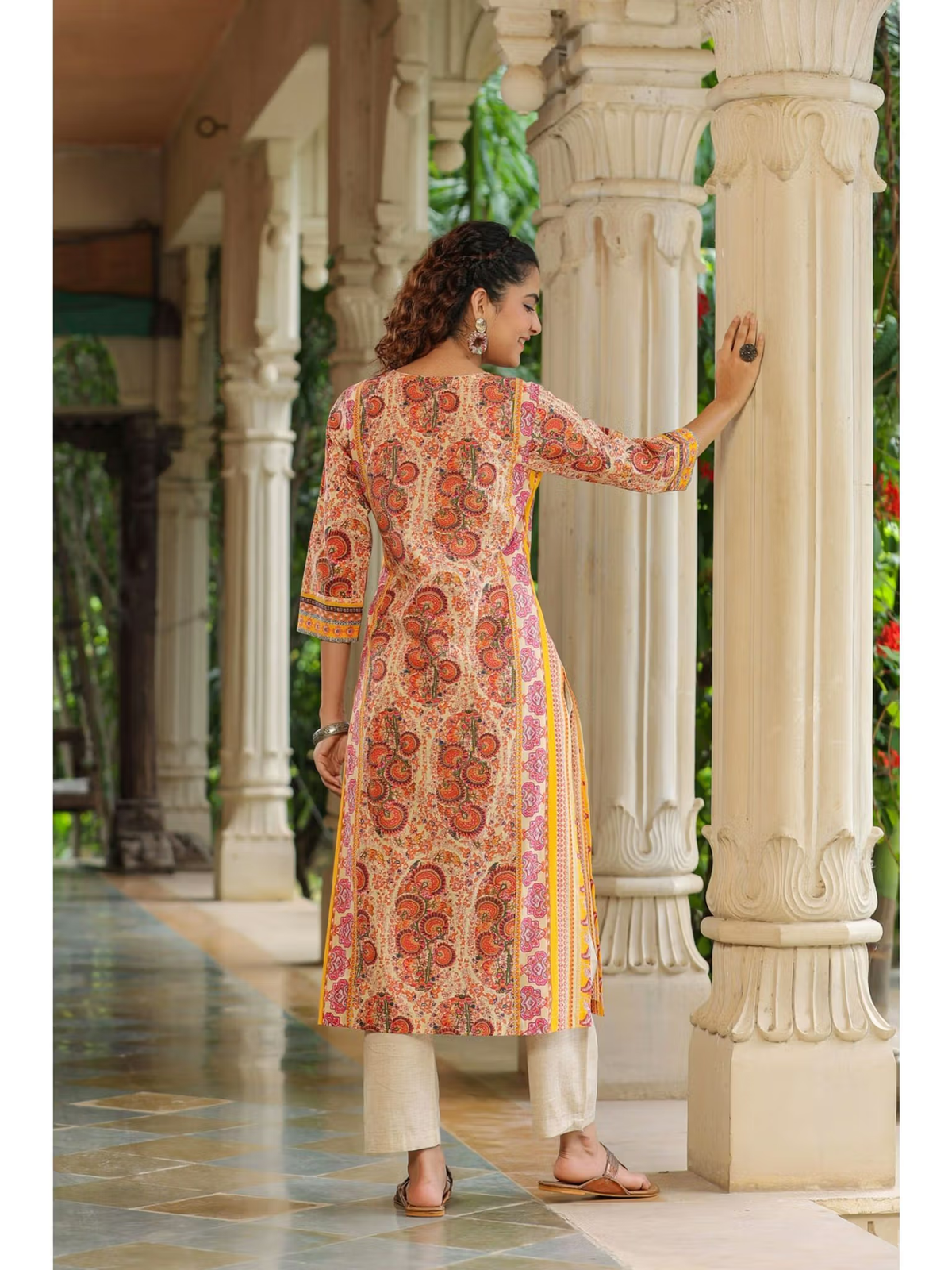 Aromie printed fusion wear flared jumpsuit for women back view with three quarter sleeves