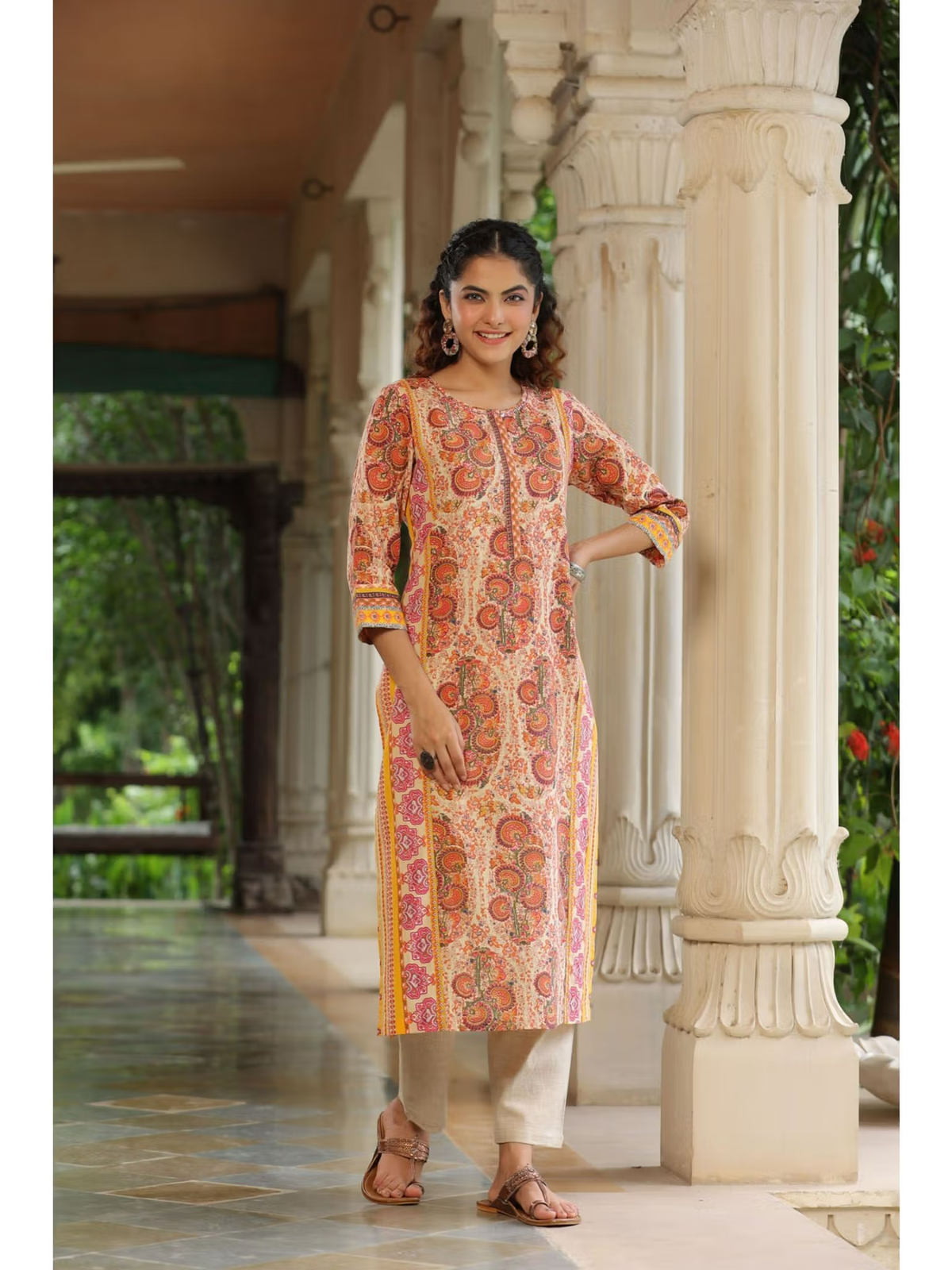 Aromie fusion wear printed kurta with beige pants and sandals model by pillars flared jumpsuit for women