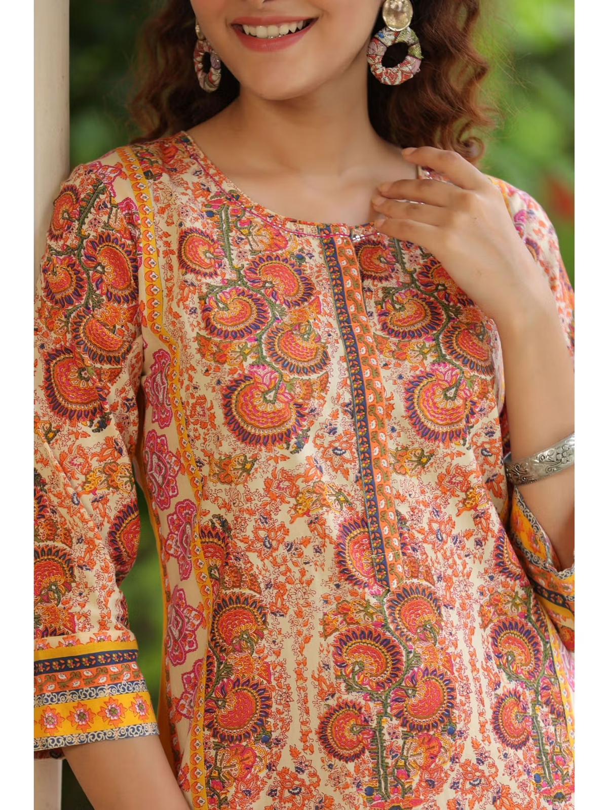 Aromie colorful paisley printed flared jumpsuit for women with three quarter sleeves and round neckline
