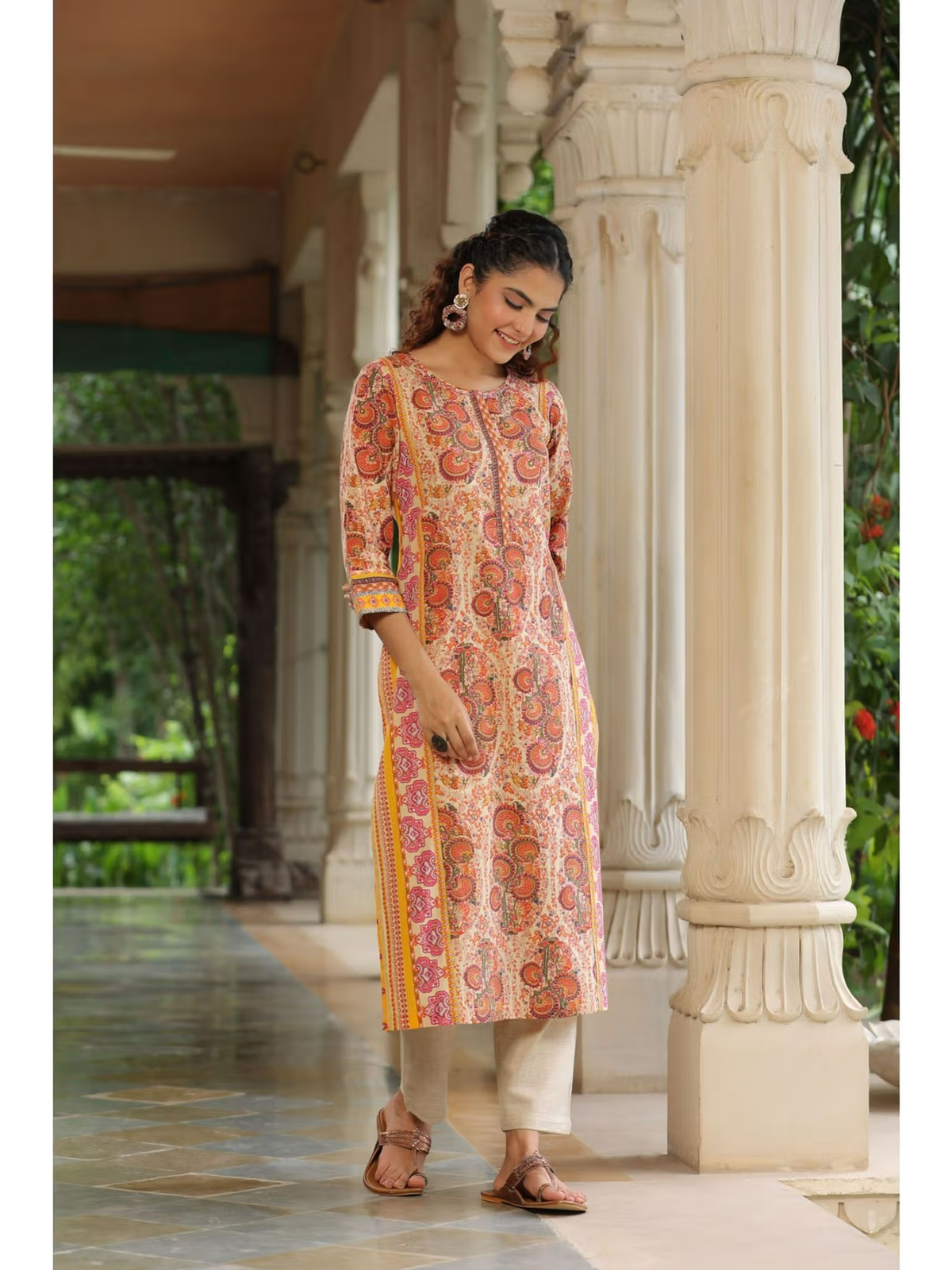 aromie fusion wear flared jumpsuit for women in pink paisley print midi kurta style with three quarter sleeves