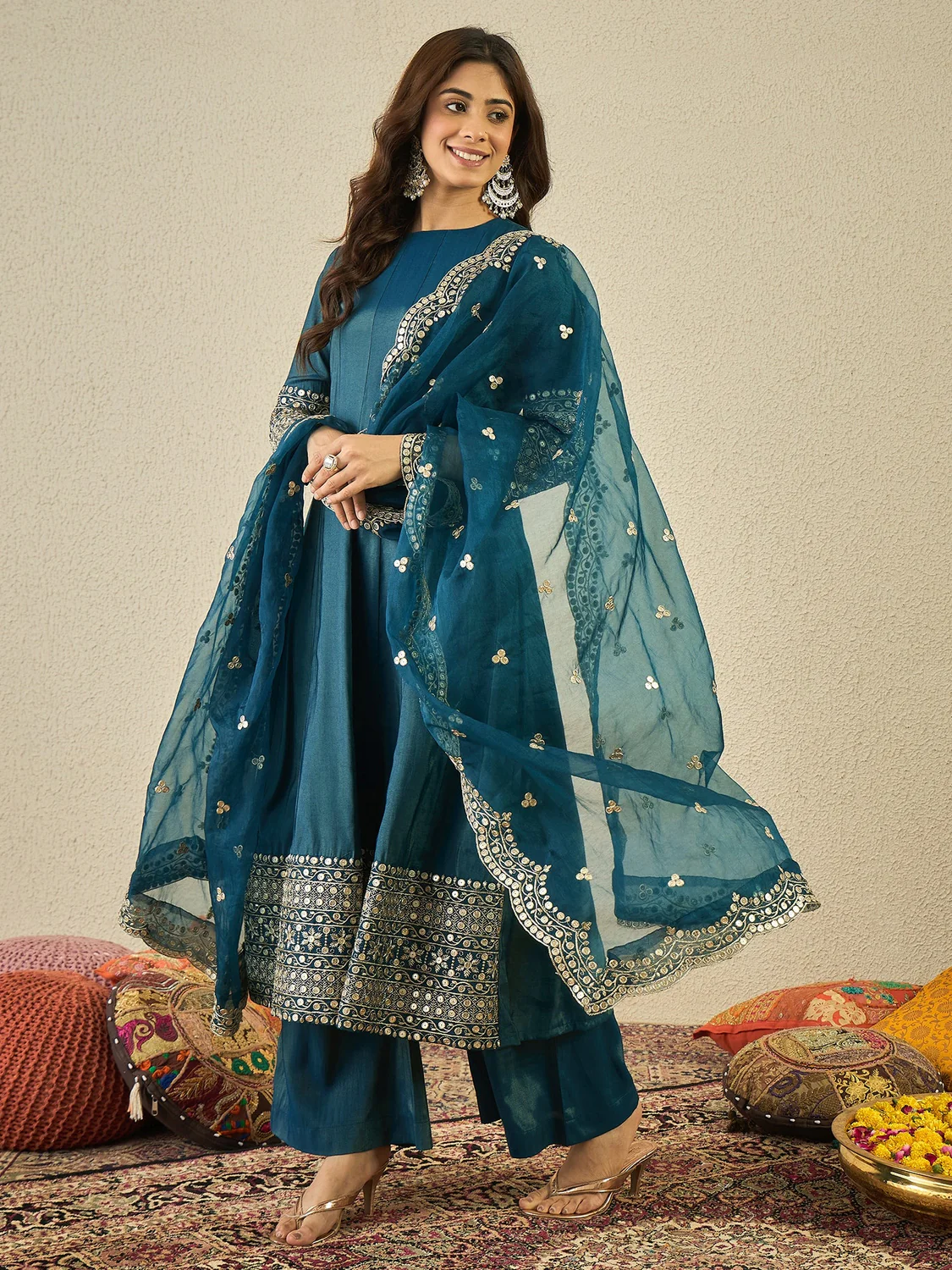 Teal Anarkali lehenga set online Canada, featuring rich fabric with intricate detailing, perfect for festive occasions.