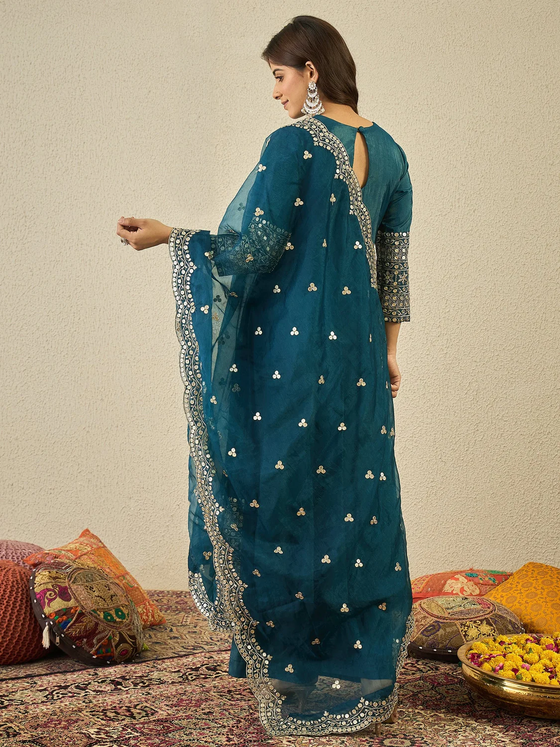 Teal Anarkali lehenga set online Canada featuring intricate embroidery, perfect for festive occasions.