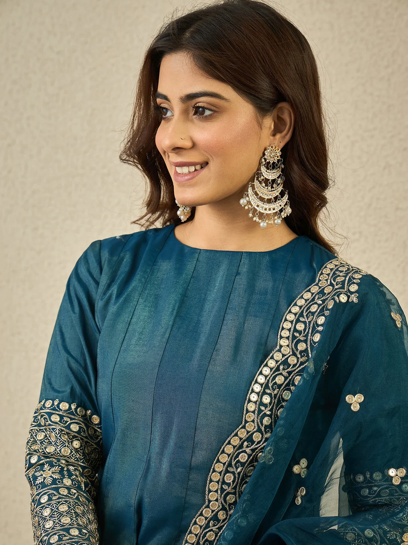 Teal Anarkali lehenga set online Canada featuring intricate embroidery, ideal for festive occasions