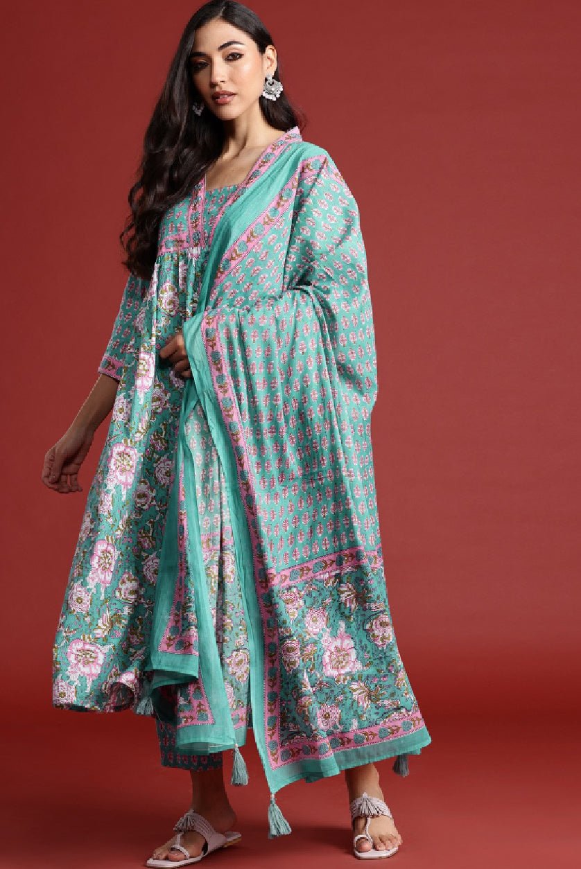 Teal floral kurta set from Aromie featuring intricate patterns and elegant draping for a stylish look