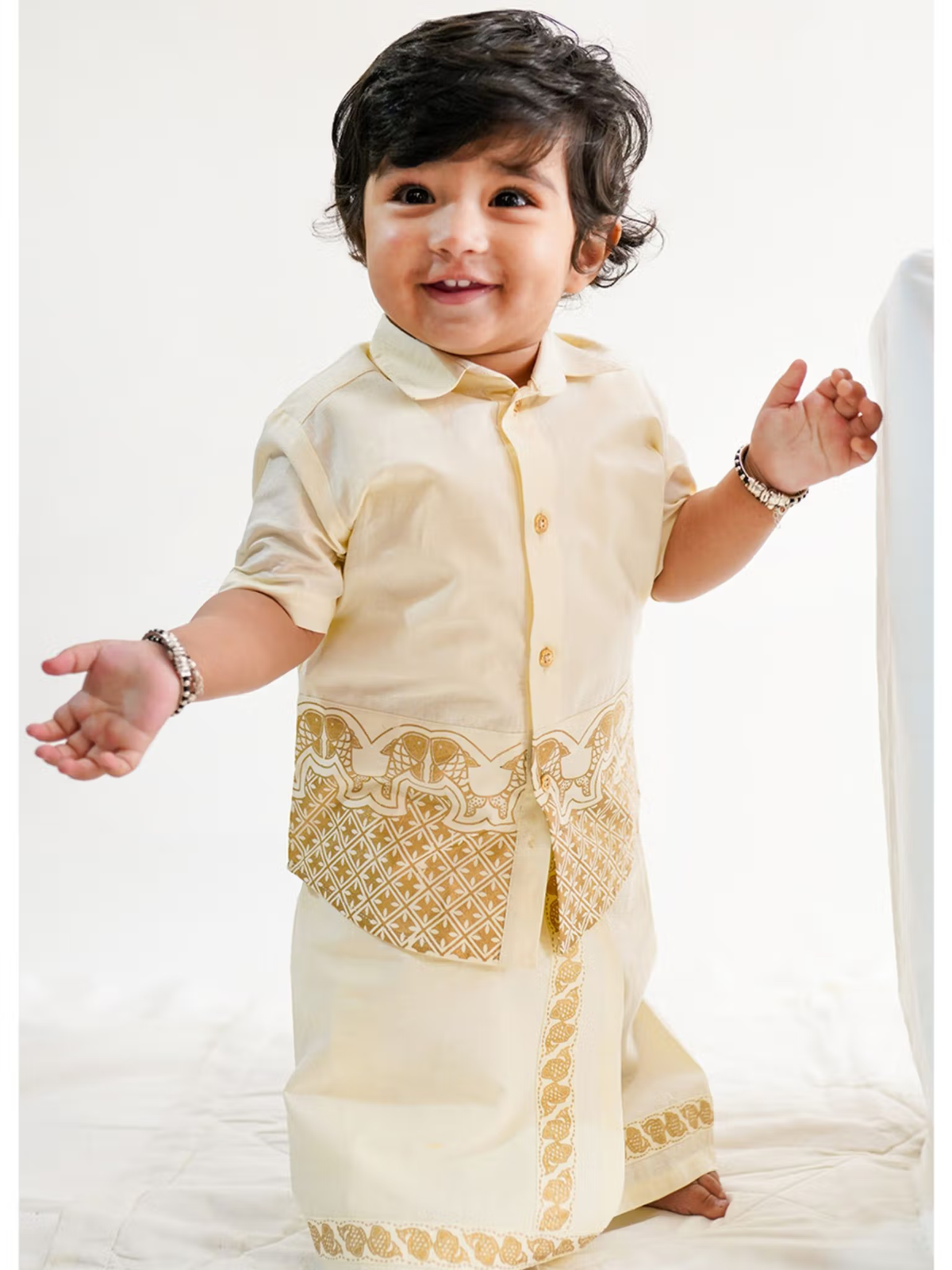 Toddler in cream and gold boys mundu dhoti set Canada with short kurta top and decorative border for festivals