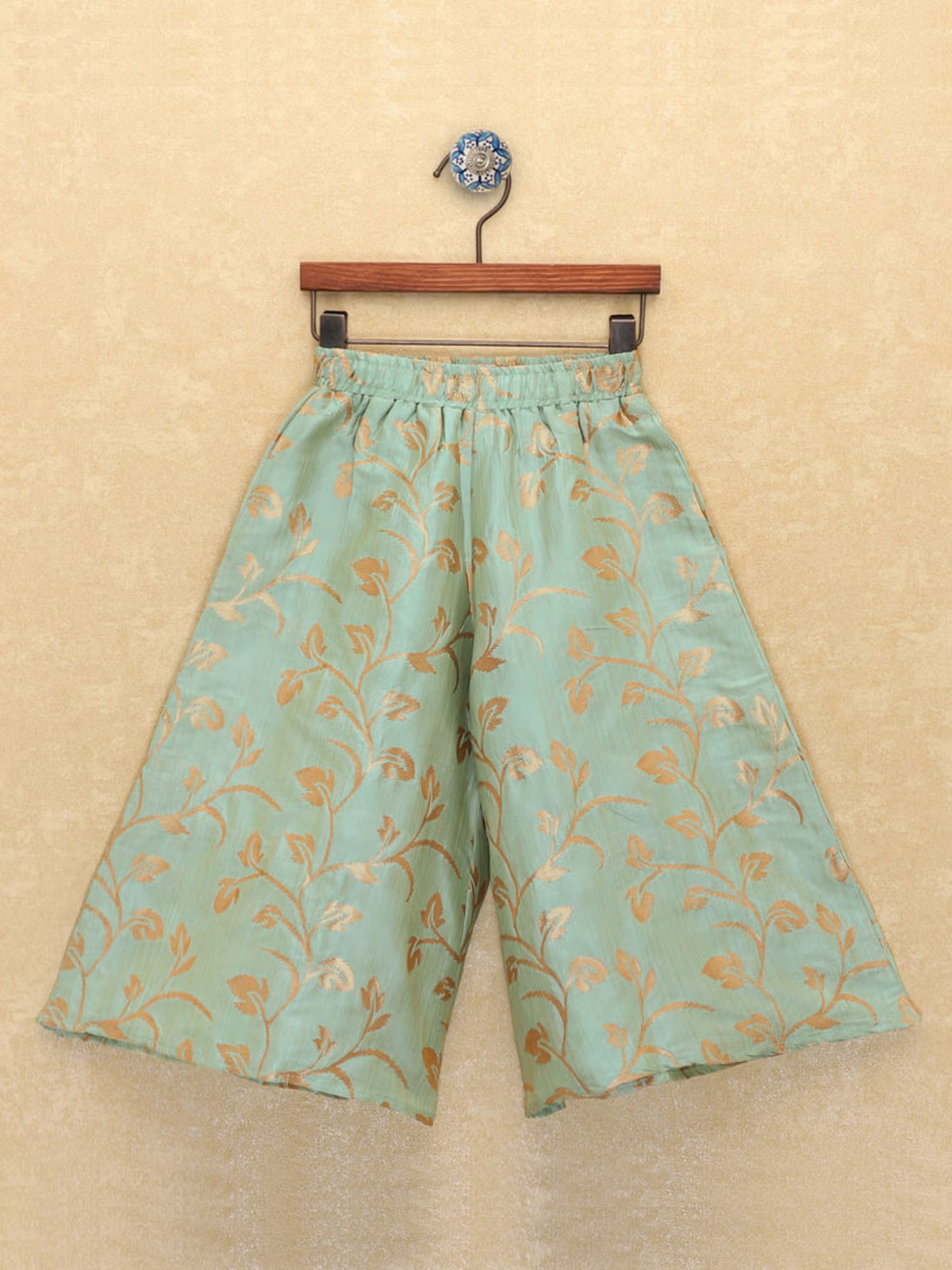 Mint green wide leg palazzo with gold leaf pattern and elastic waist on hanger green leaf printed kurta palazzo dupatta set