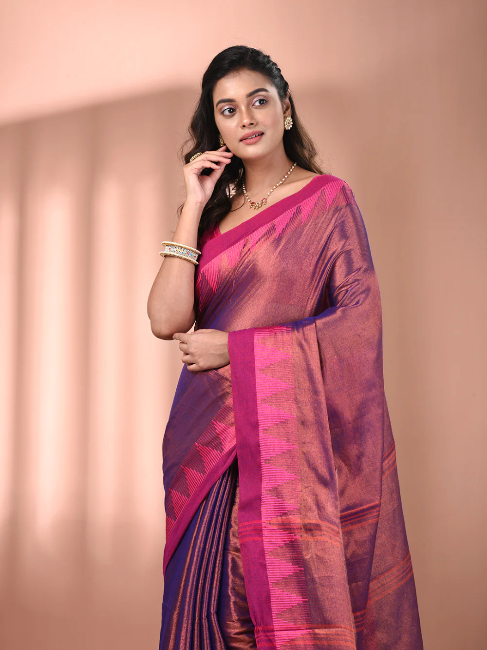 Elegant purple tissue saree with contrasting pink border, perfect for weddings and special occasions in Canada.