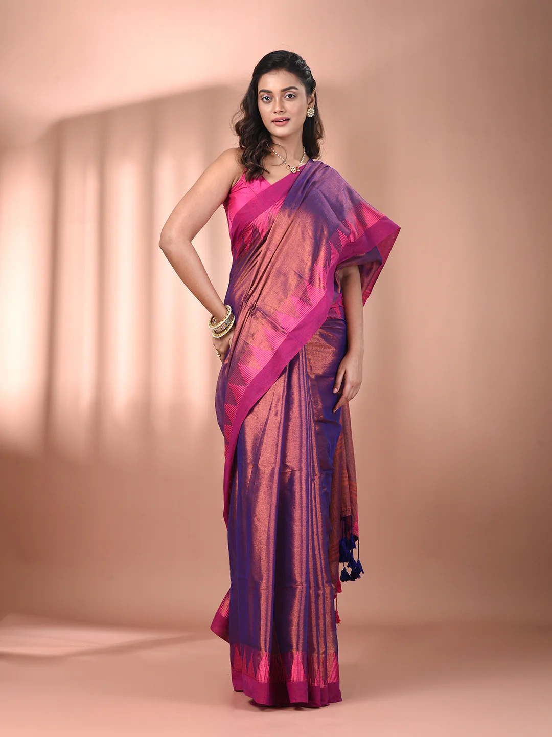 Front view of a tissue saree in vibrant purple and pink, perfect for formal occasions in Canada.