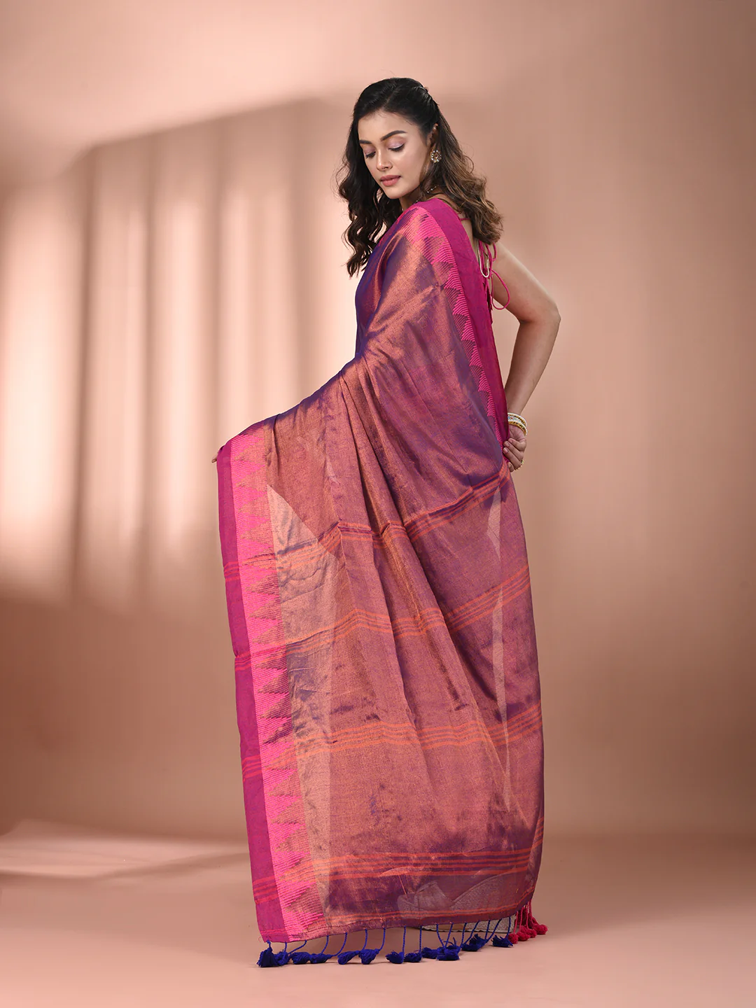 Elegant tissue saree in shades of pink and purple, perfect for weddings in Canada