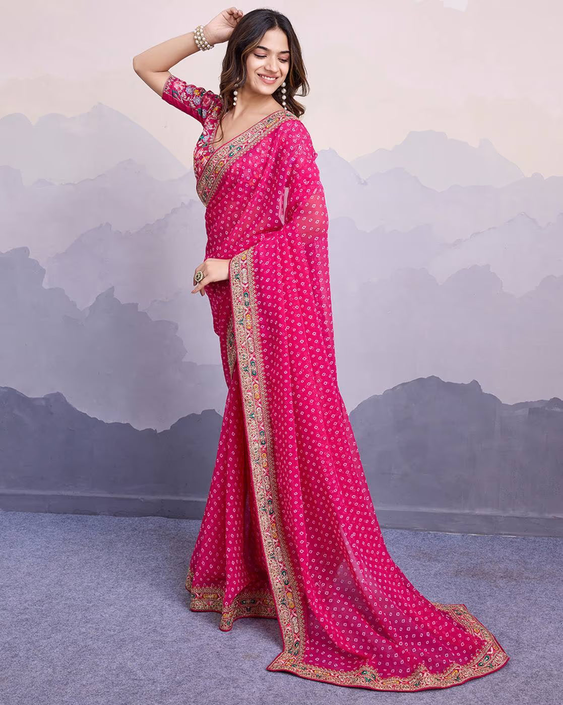 Aromie pink tissue saree for parties with floral design and intricate border details