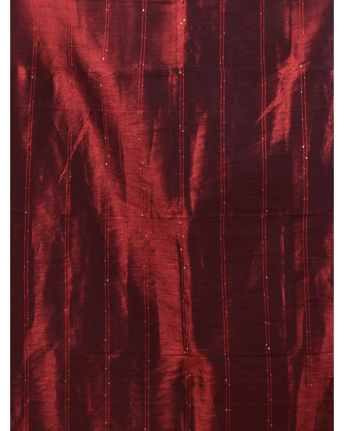 Deep red tissue saree from Aromie with intricate detailing, perfect for weddings or special occasions, available online in Canada.