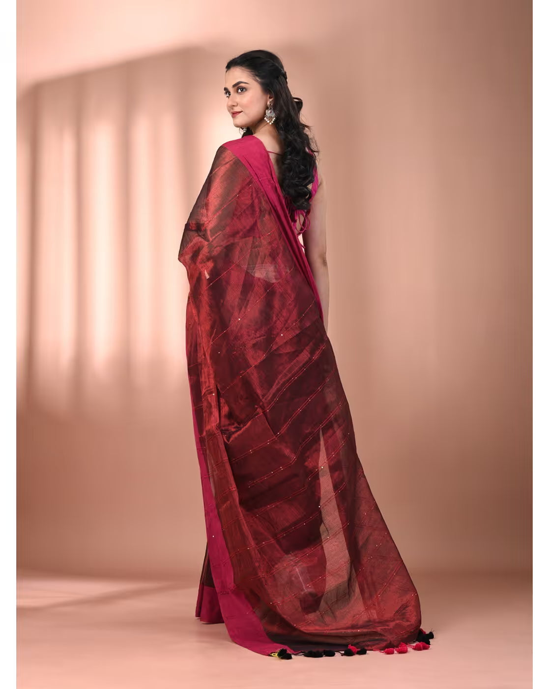 Elegant maroon tissue saree online Canada with a sheer finish, perfect for festive occasions