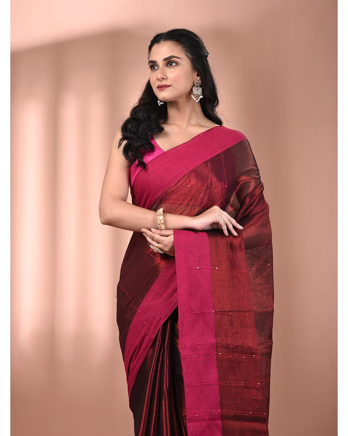 Elegant maroon tissue saree with intricate detailing, perfect for weddings or special occasions, available online in Canada