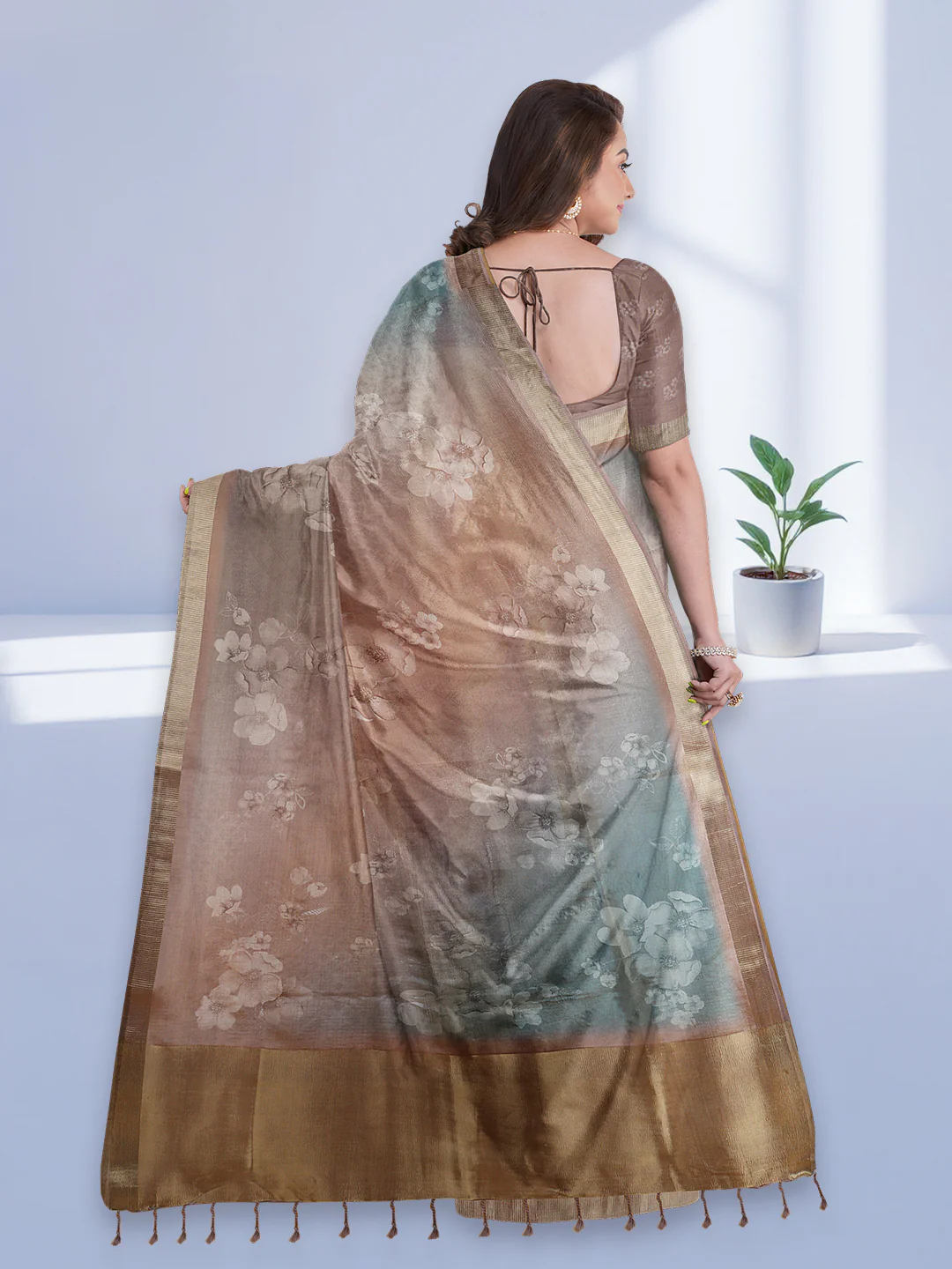 Aromie tissue saree USA in gradient brown and teal with floral design, perfect for elegant occasions