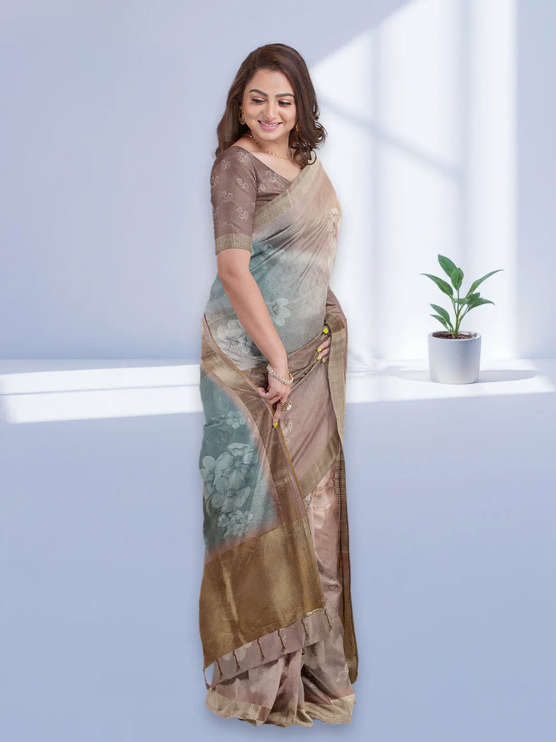 Elegant tissue saree in beige and blue with floral design, perfect for weddings and special occasions in the USA.