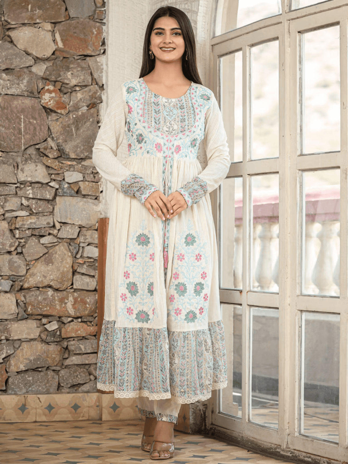 Floral Anarkali kurta pants set by Aromie featuring intricate embroidery and a flowing design