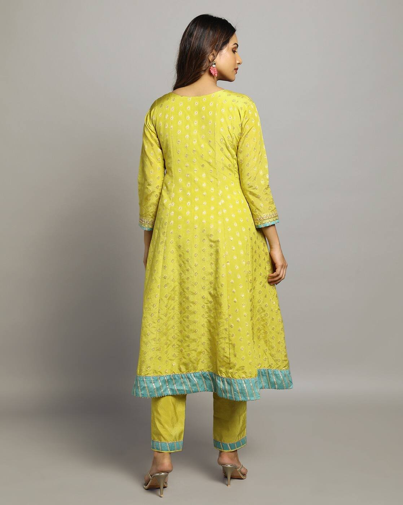 Aromie three piece Kurtha set in yellow with blue border styling showcasing Georgette Anarkali Gown Canada