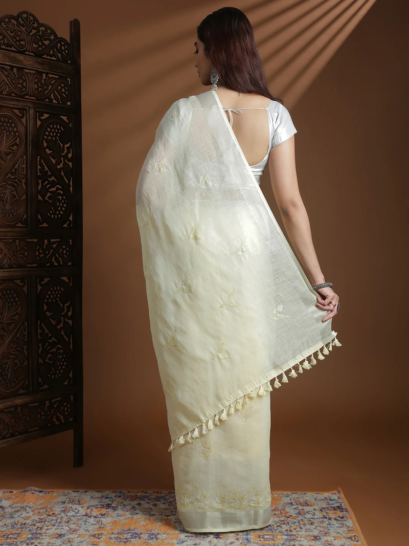 Lemon yellow semi linen embroidered saree online Canada, showcased in a back view with tassel detailing, perfect for festive occasions